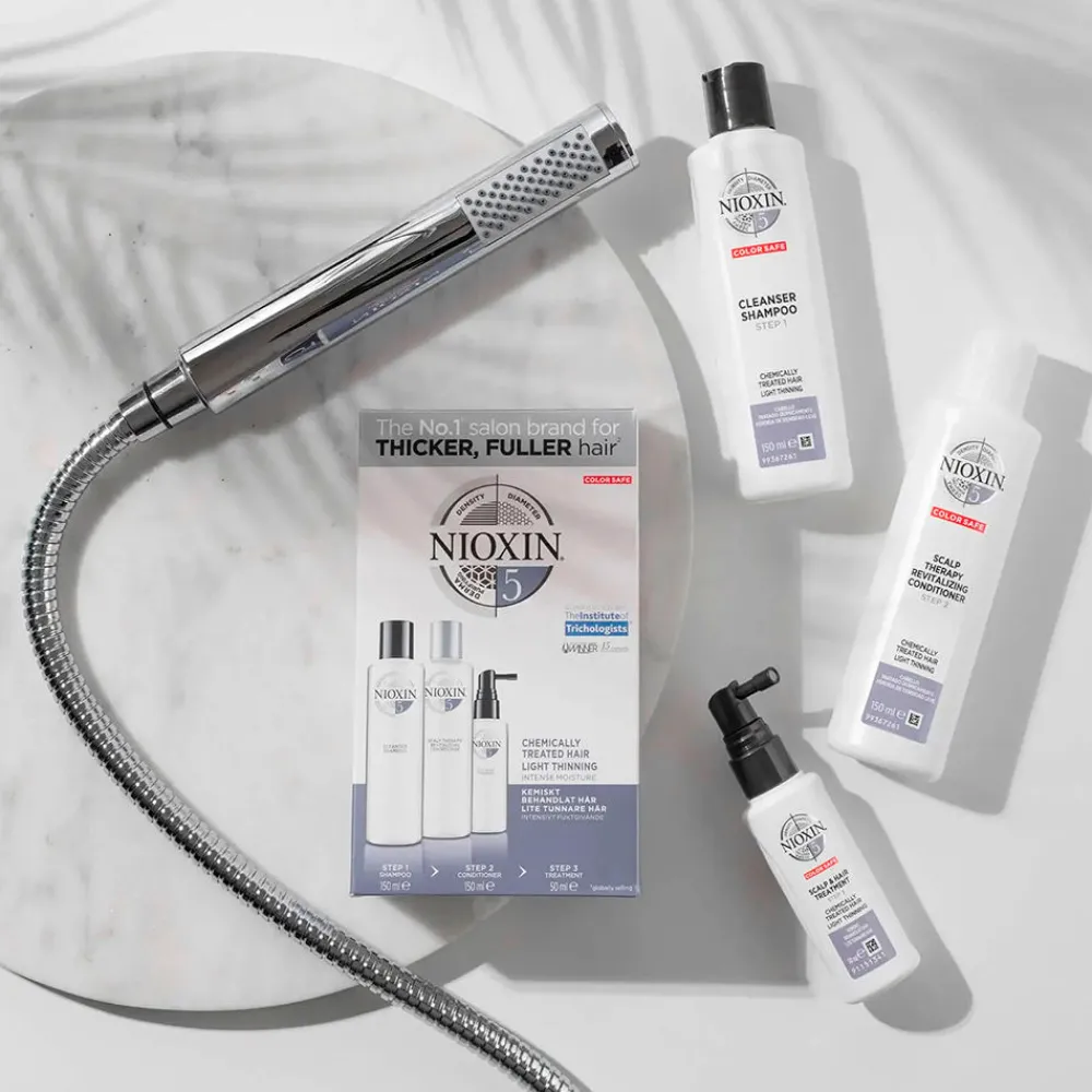 nioxin_sistema___acondici_5-1.webp Nioxin Sistema 5 - Acondicionador - Cabello Tratado Quimicamente Y Debilitado - Paso 2 Store